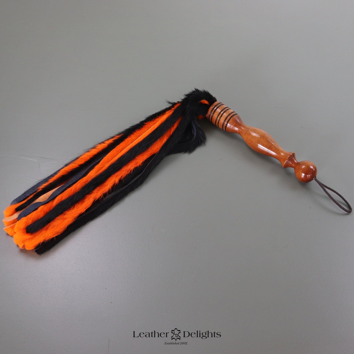 Martinet en Fourrure de Lapin Noir et Orange