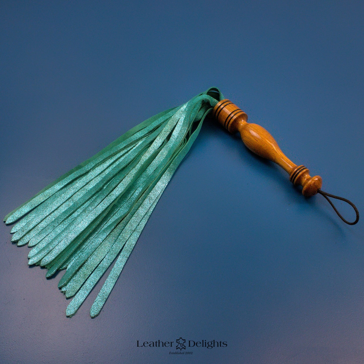 Metallic Aqua Suede Flogger