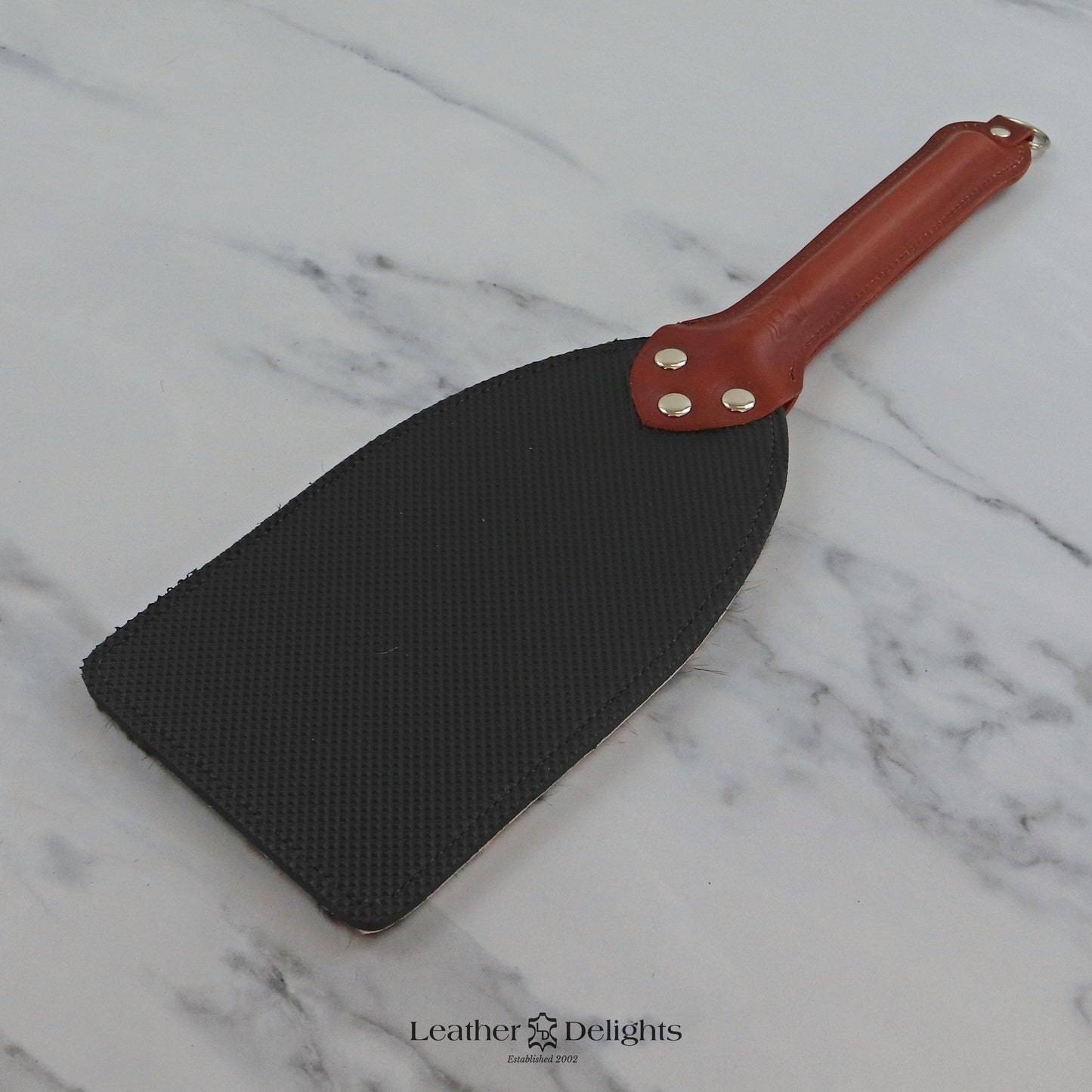 Booty Beater - Animal Print Sheepskin & Black Dimpled Rubber