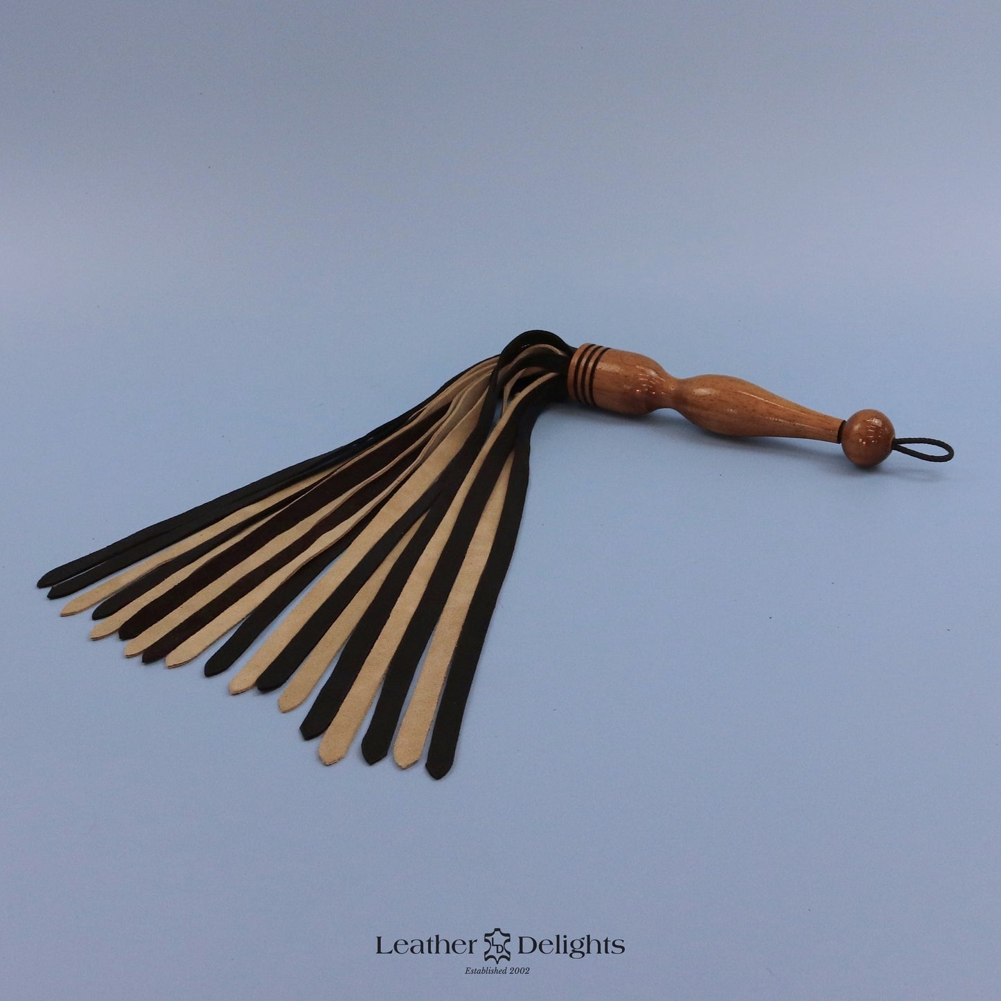 Flogger en daim orange coucher de soleil