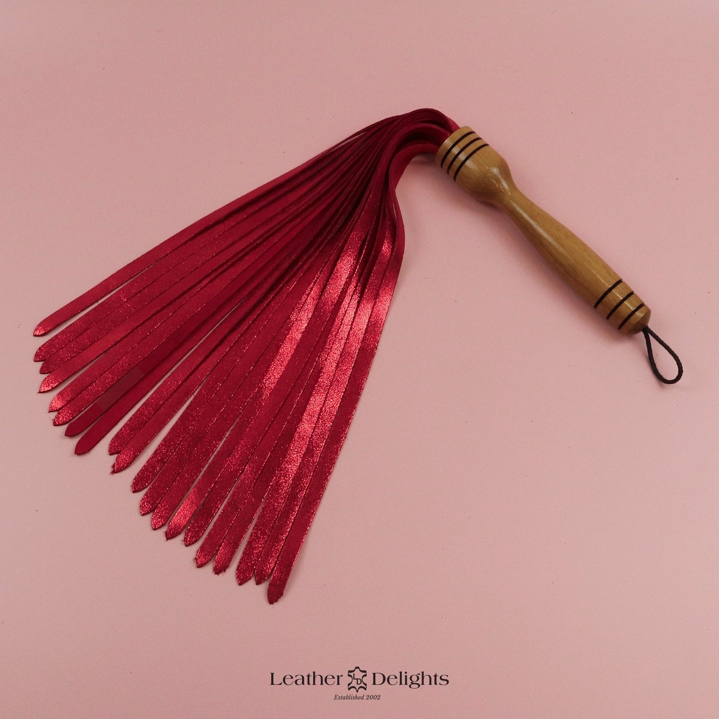 Flogger en daim orange coucher de soleil