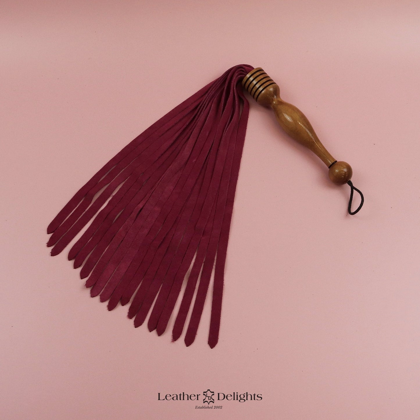 Flogger en daim orange coucher de soleil