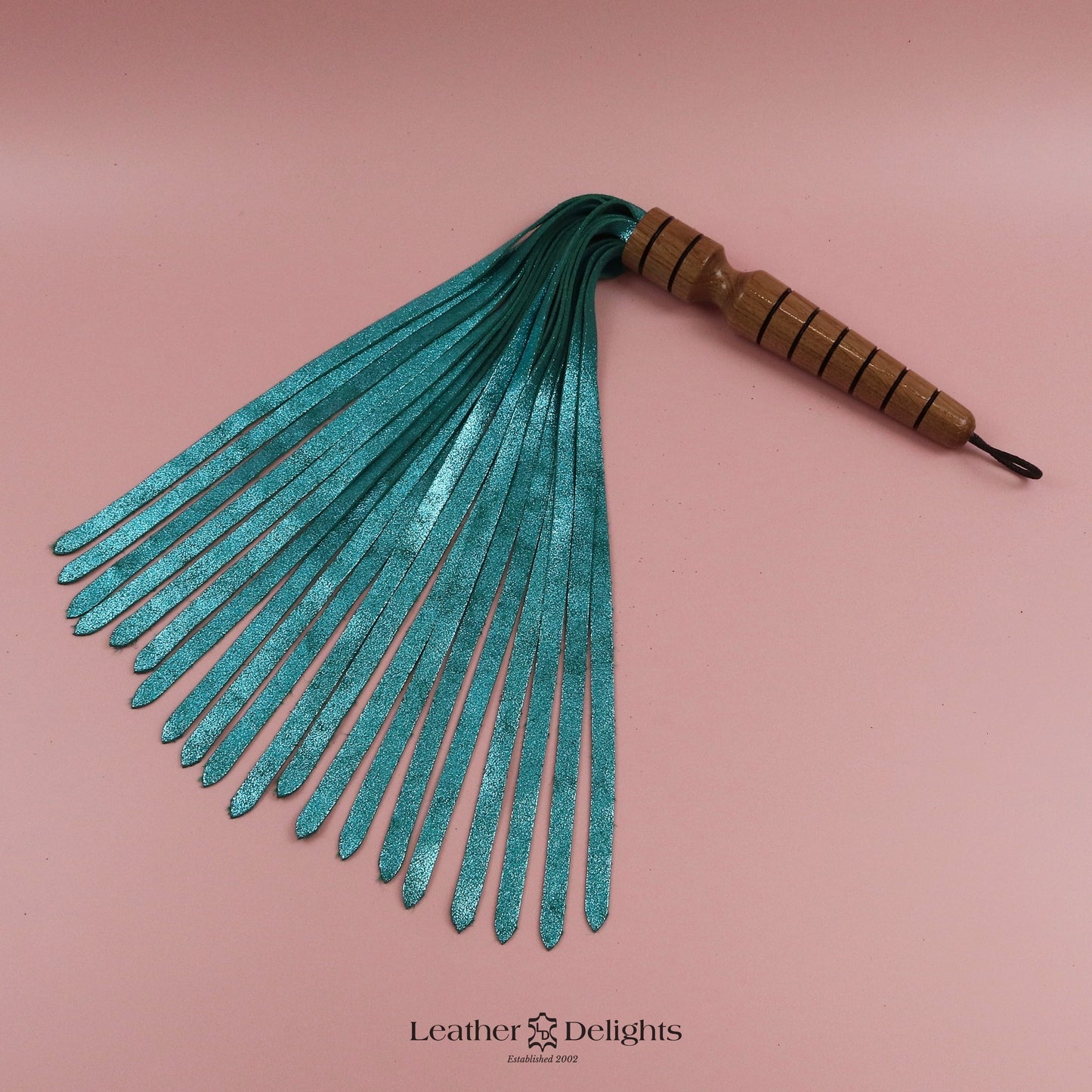 Flogger en daim orange coucher de soleil