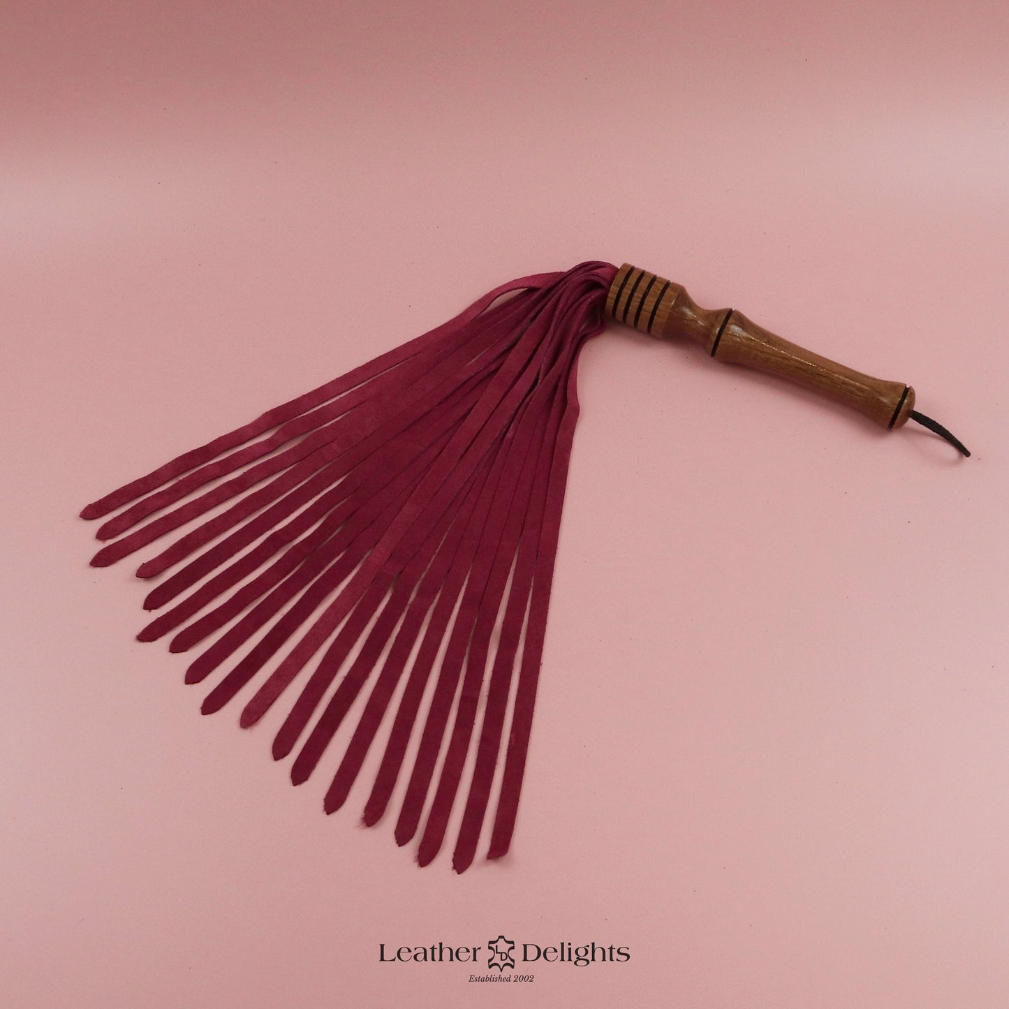 Flogger en daim orange coucher de soleil