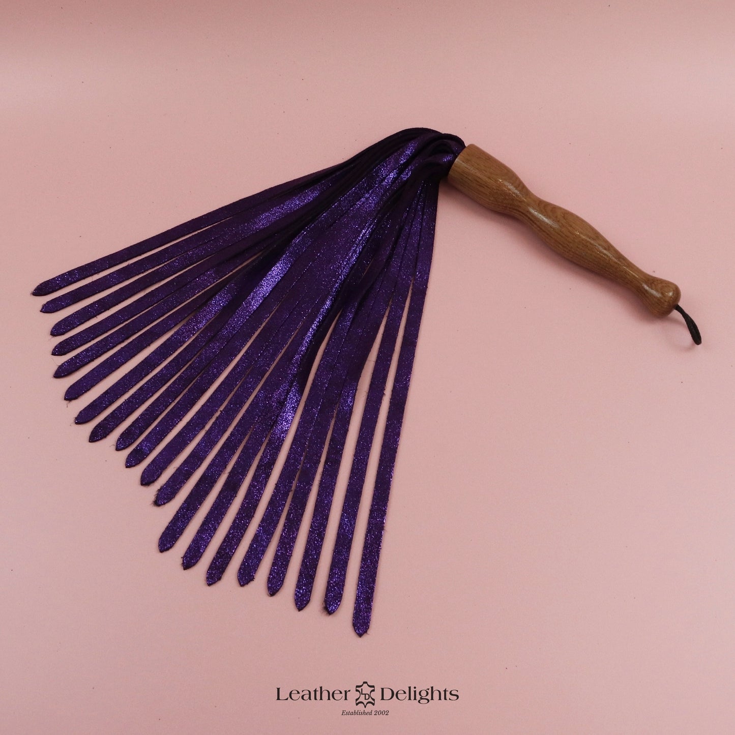 Flogger en daim orange coucher de soleil