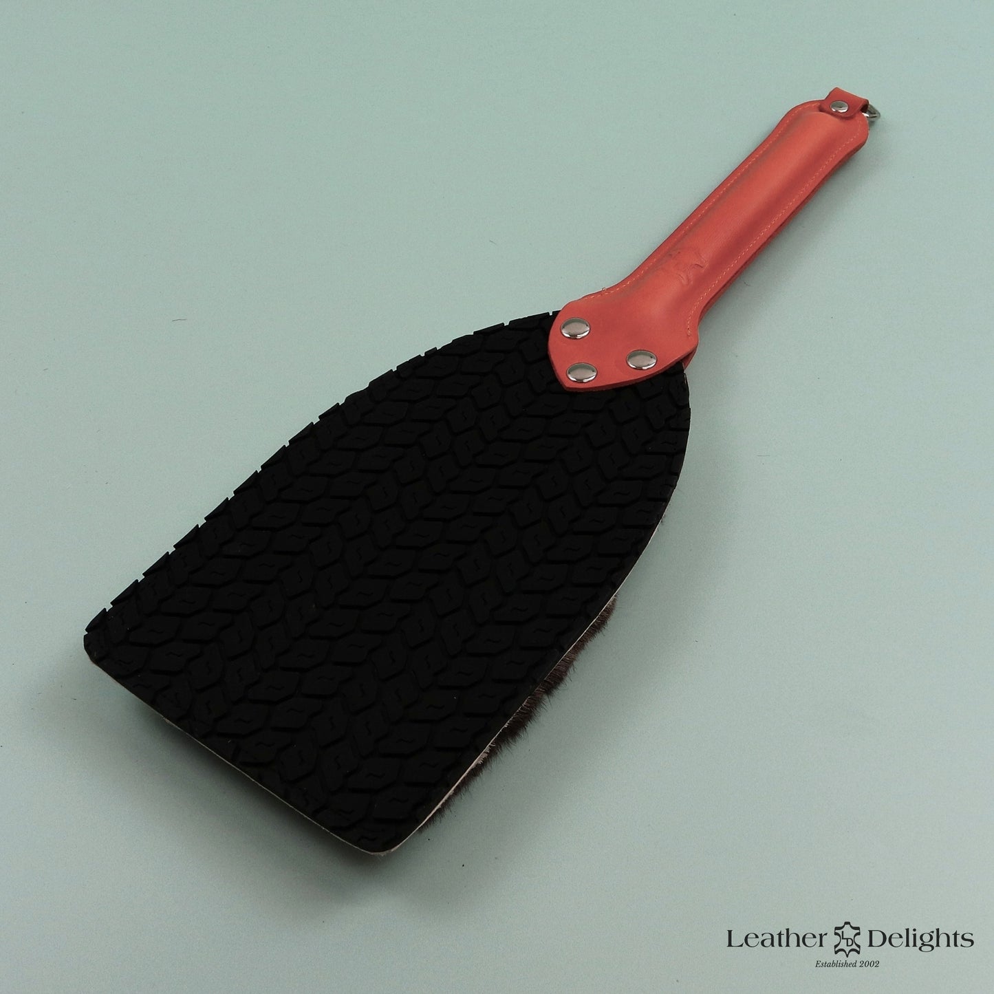 Booty Beater - Tyre Tread Rubber & Hair on Hide Reindeer with a Orange Handle