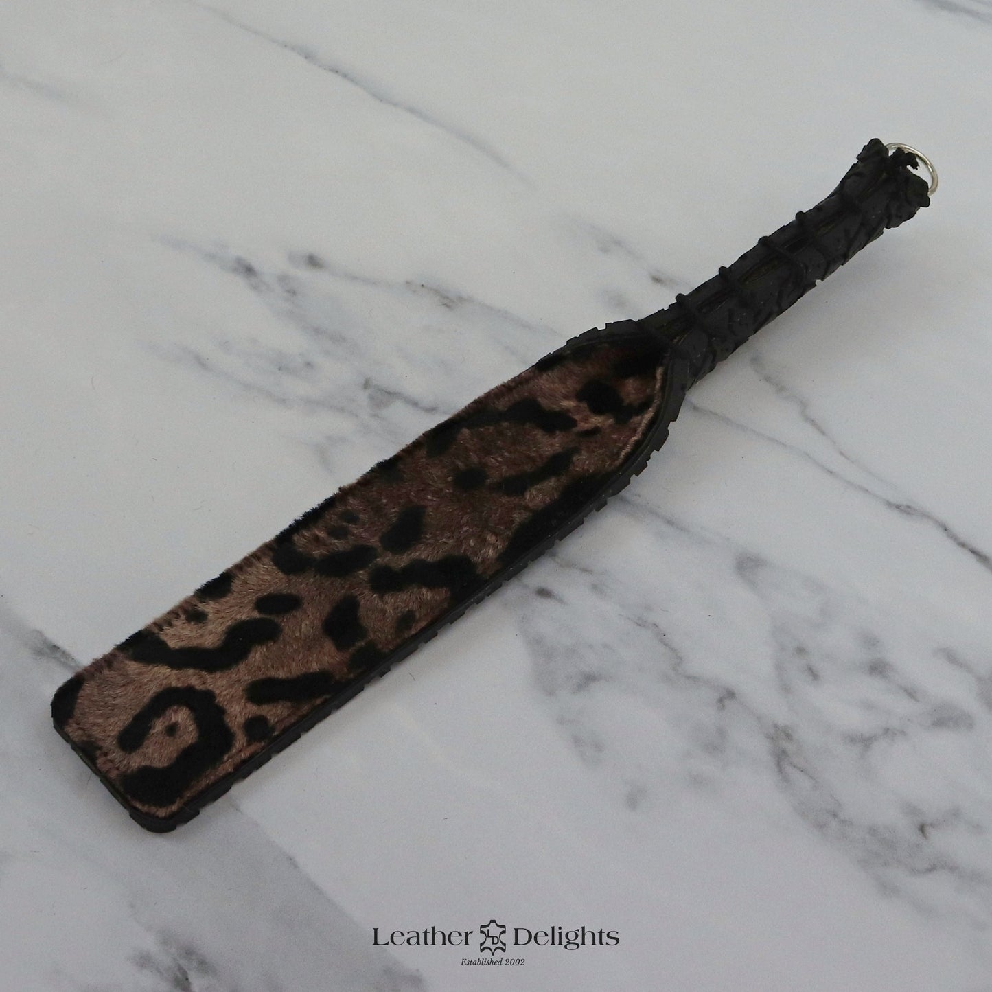 Double Cheek Slapper - Animal Print Sheepskin & Black Tyre Tread Rubber