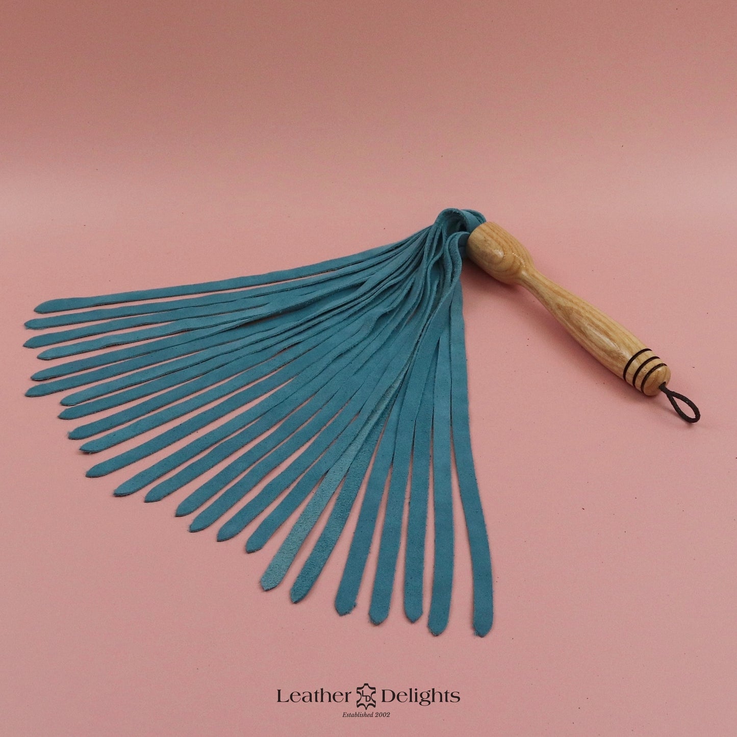 Turquoise Suede Flogger