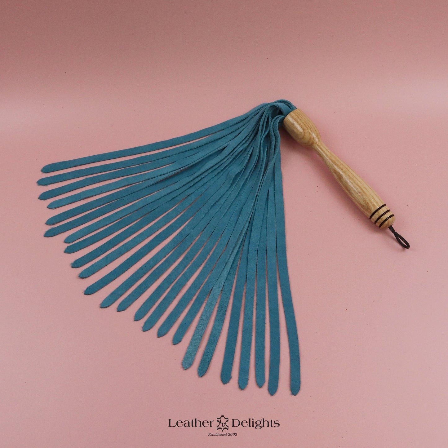 Turquoise Suede Flogger