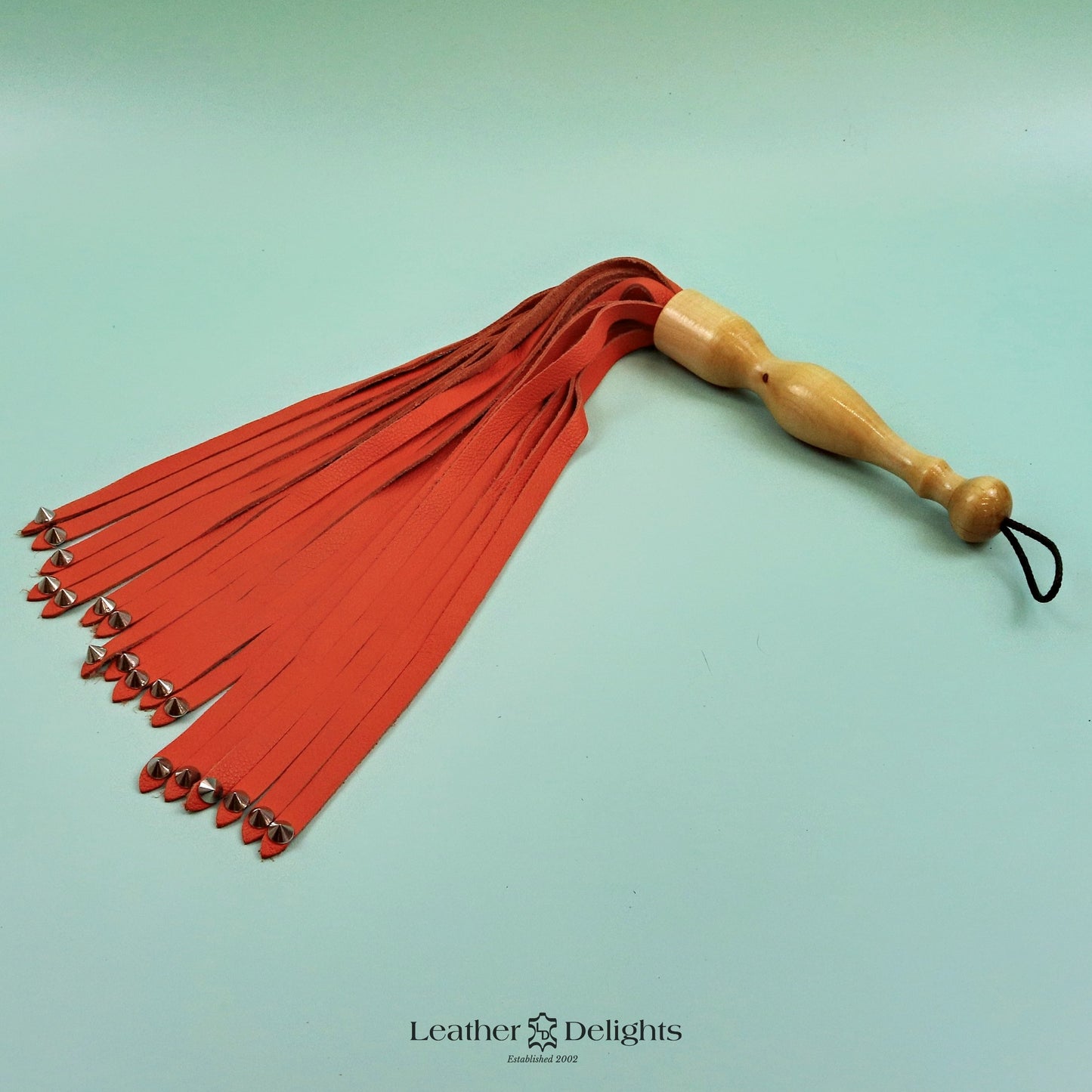 Soft Orange Leather Flogger with Spiked Tips