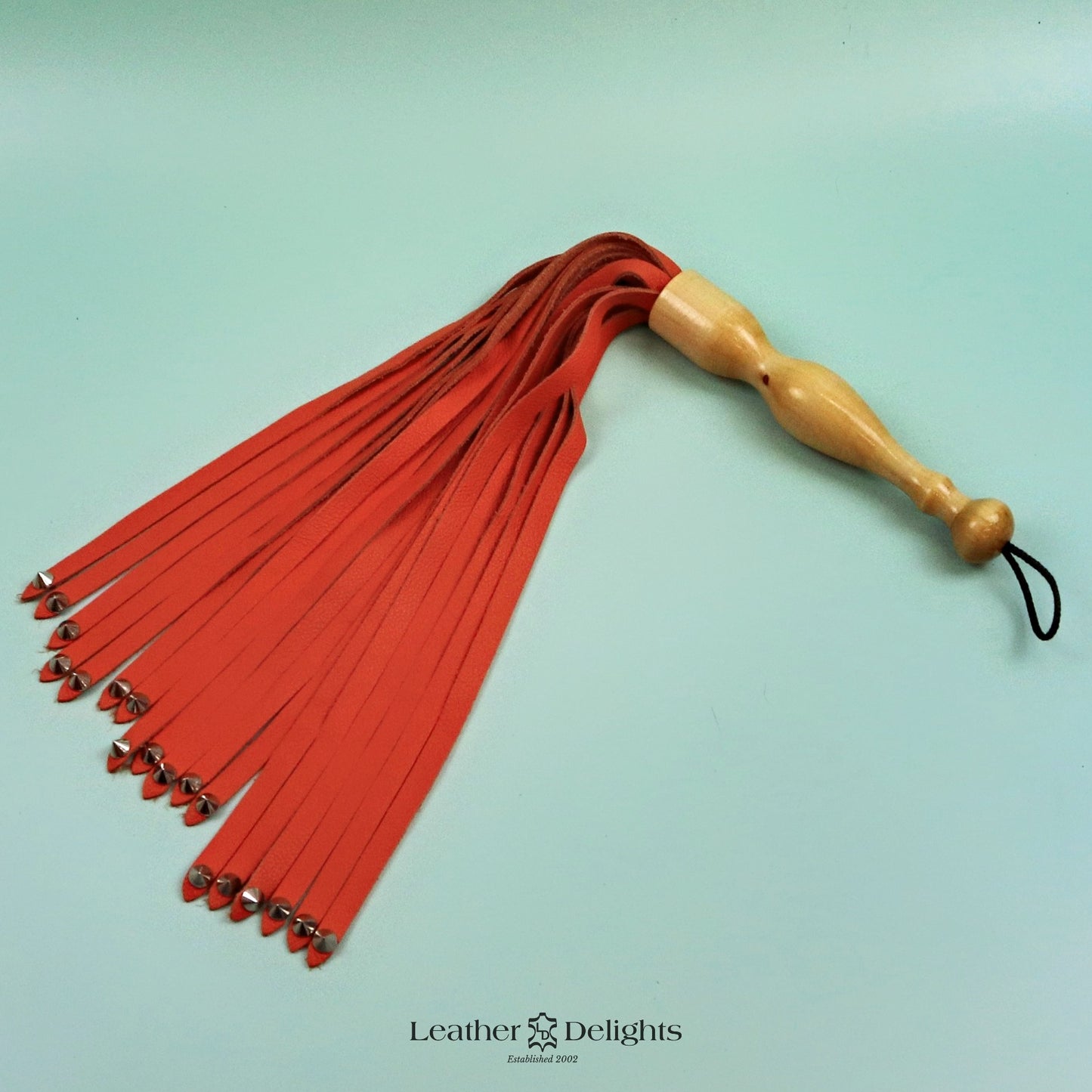 Soft Orange Leather Flogger with Spiked Tips