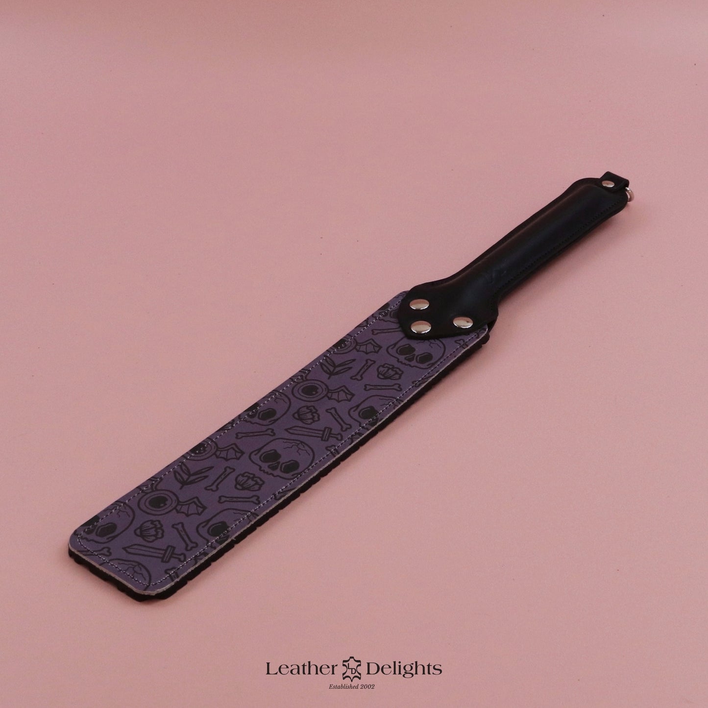 Punishment Paddle - Bones Leather & Black Tyre Tread Rubber