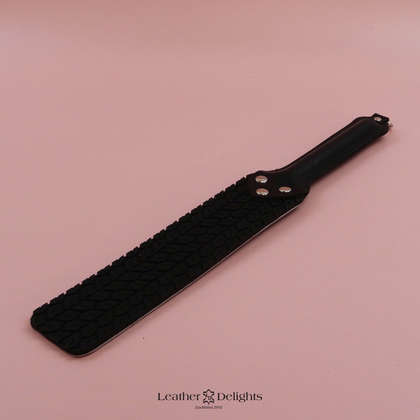 Punishment Paddle - Bones Leather & Black Tyre Tread Rubber