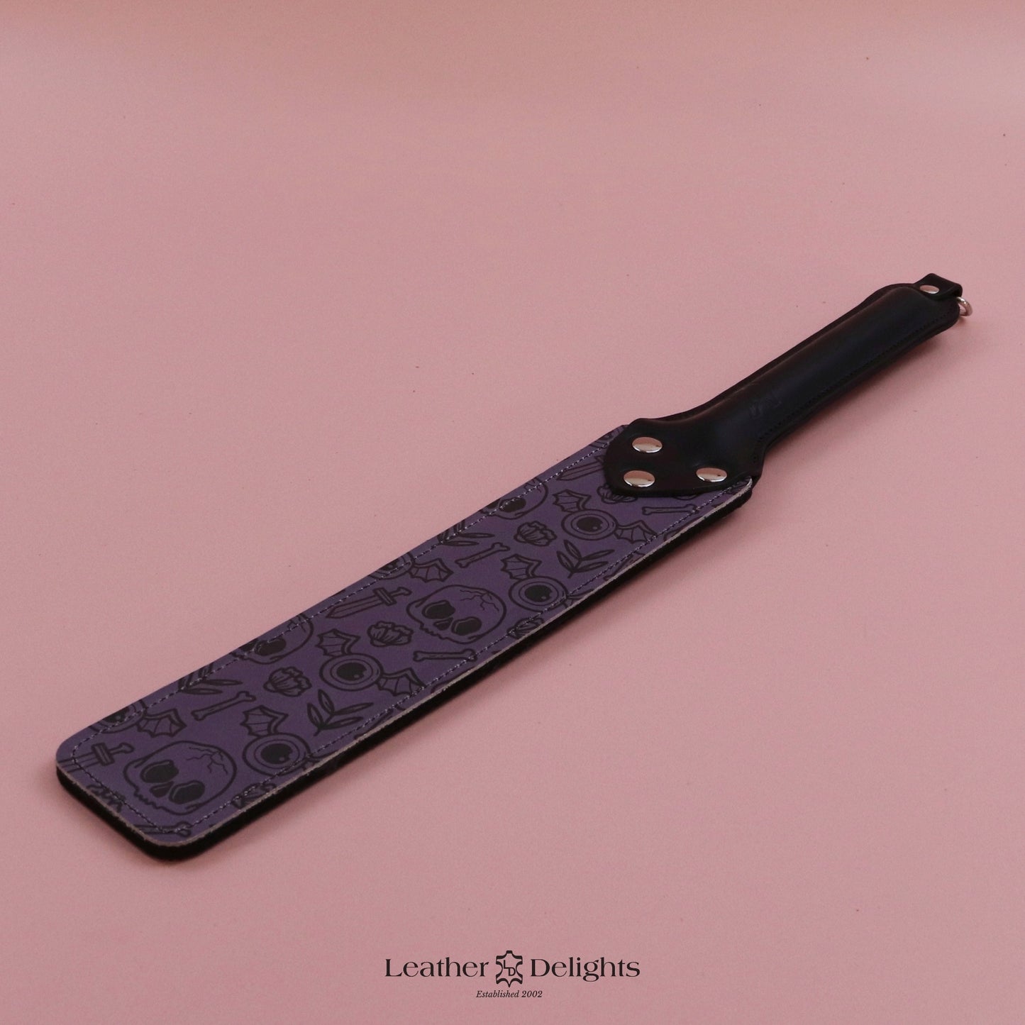 Punishment Paddle - Bones Leather & Black Dimpled Rubber