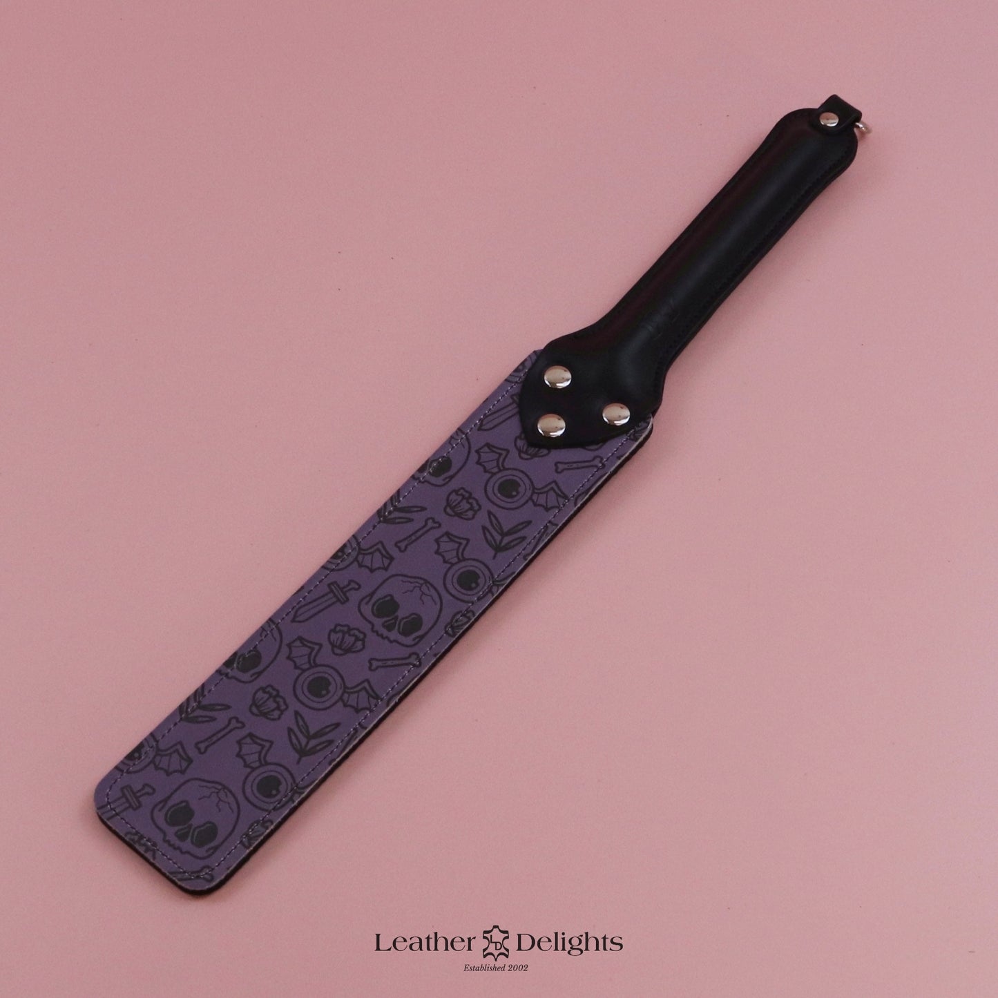 Punishment Paddle - Bones Leather & Black Dimpled Rubber