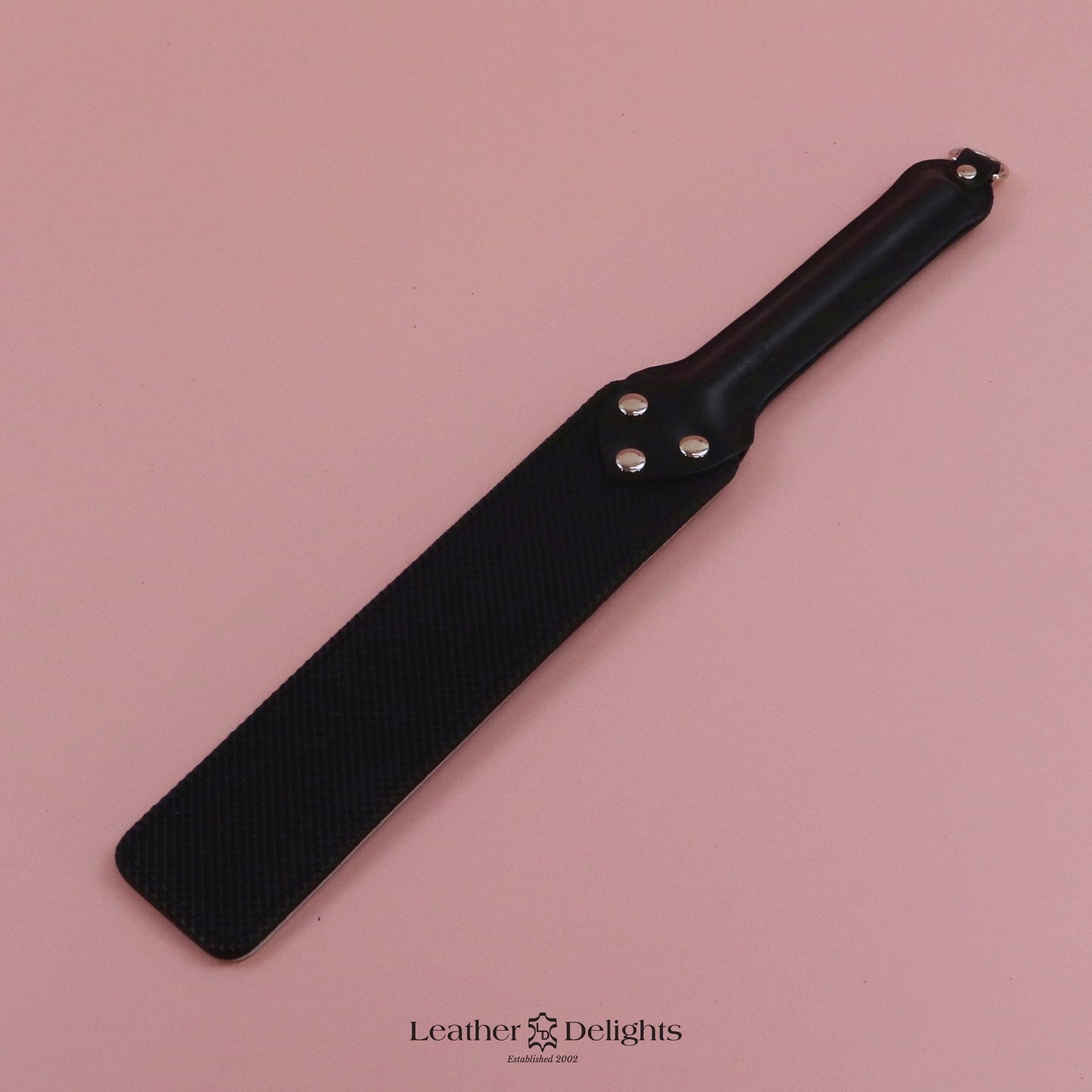 Punishment Paddle - Bones Leather & Black Dimpled Rubber