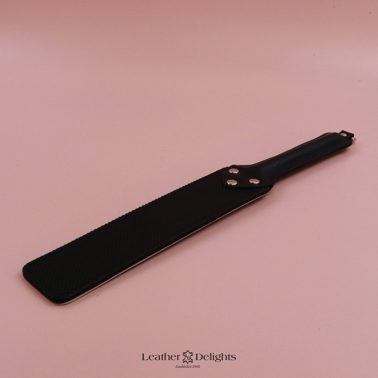 Punishment Paddle - Bones Leather & Black Dimpled Rubber