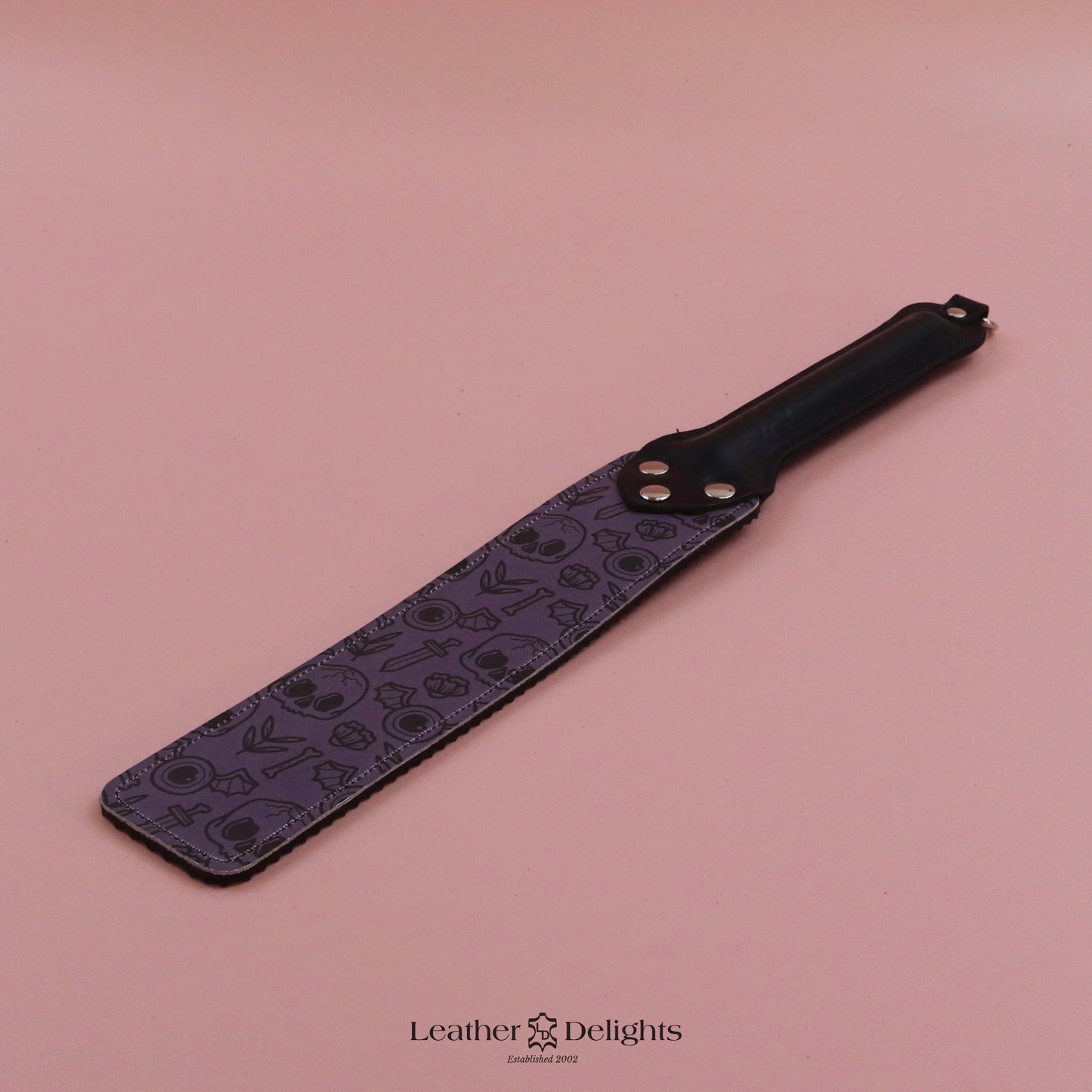 Punishment Paddle - Bones Leather & Black Ripple Rubber