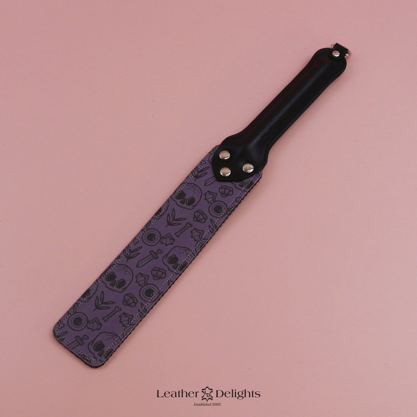 Punishment Paddle - Bones Leather & Black Ripple Rubber