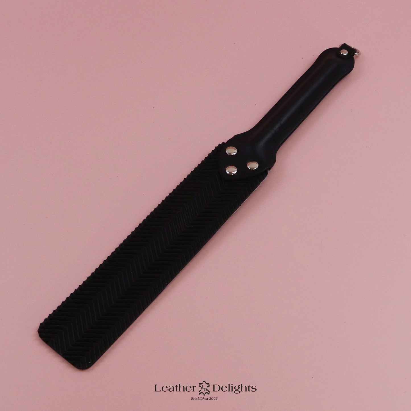 Punishment Paddle - Bones Leather & Black Ripple Rubber