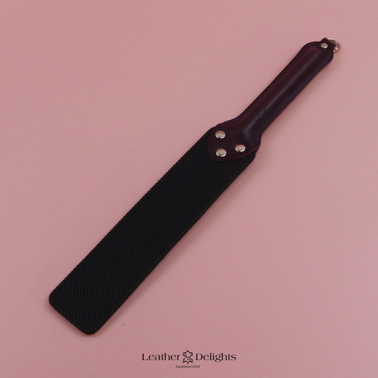 Punishment Paddle - Bones Leather & Black Dimpled Rubber with Purple Handle