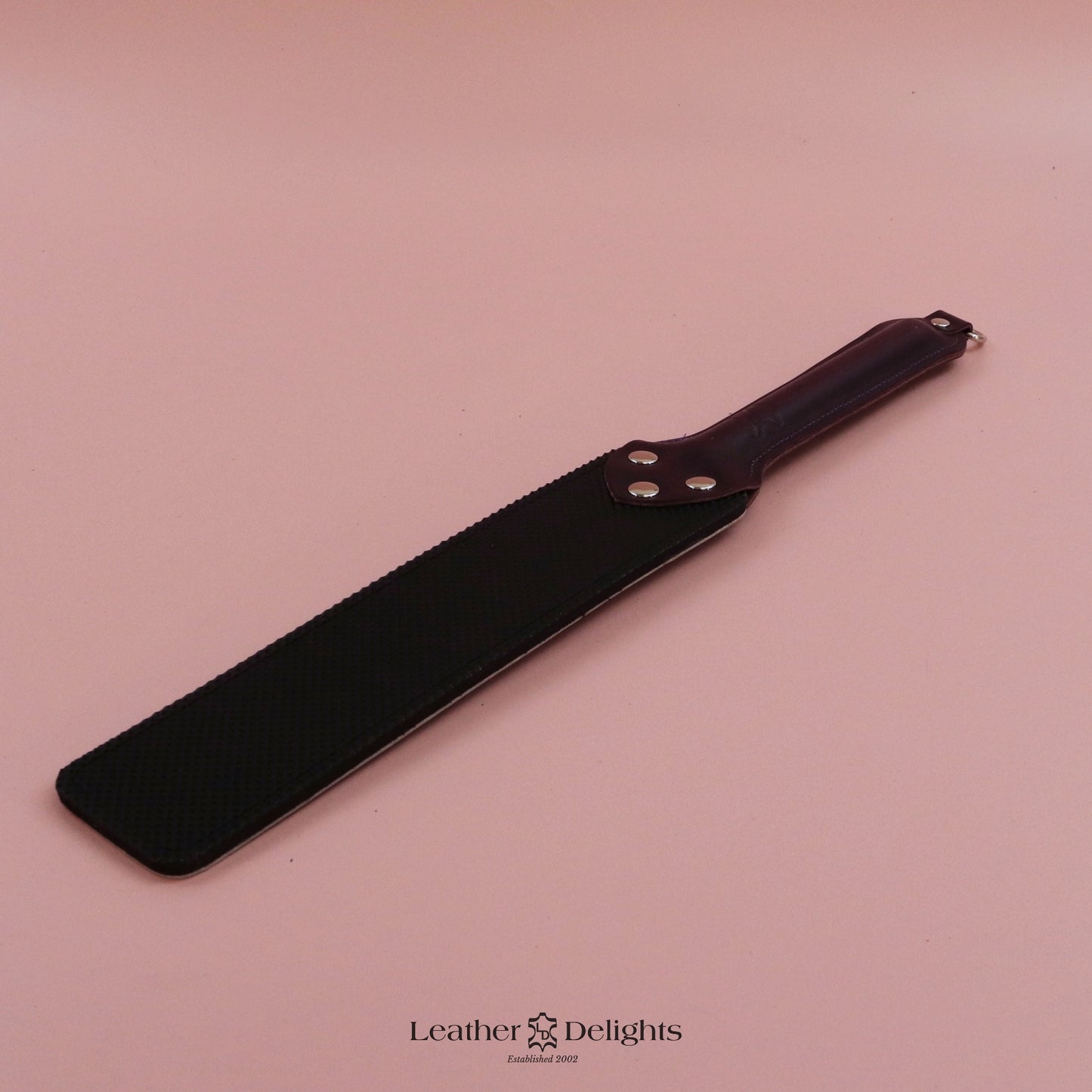 Punishment Paddle - Bones Leather & Black Dimpled Rubber with Purple Handle