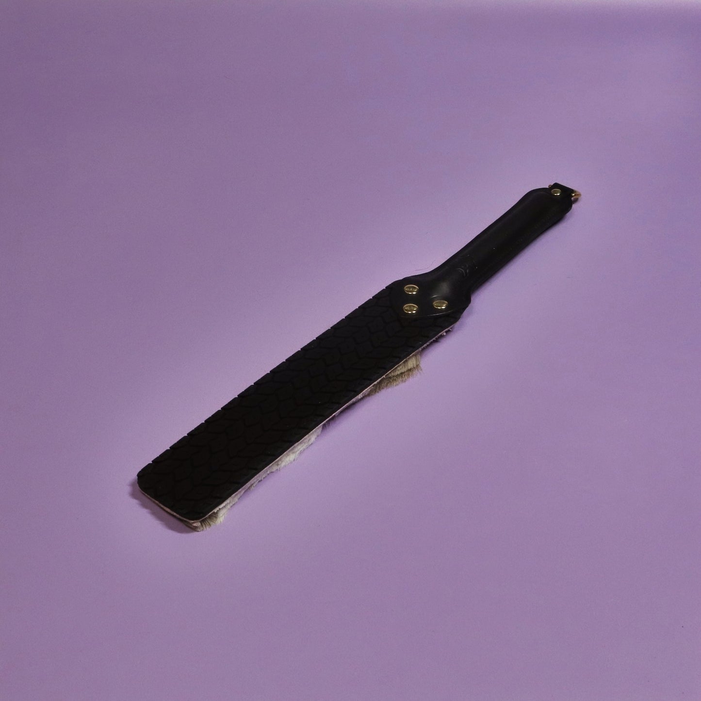 Punishment Paddle - Black Tyre Tread Rubber & Hair on Hide Reindeer with  Brass Hardware