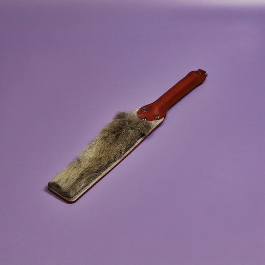 Punishment Paddle - Red Ripple Rubber & Hair on Hide Reindeer with Red Handle