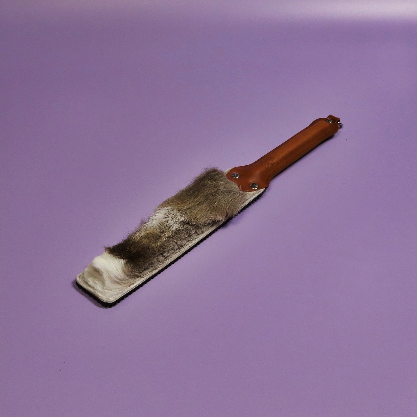 Punishment Paddle - Black Ripple Rubber & Hair on Hide Reindeer with Tan Handle