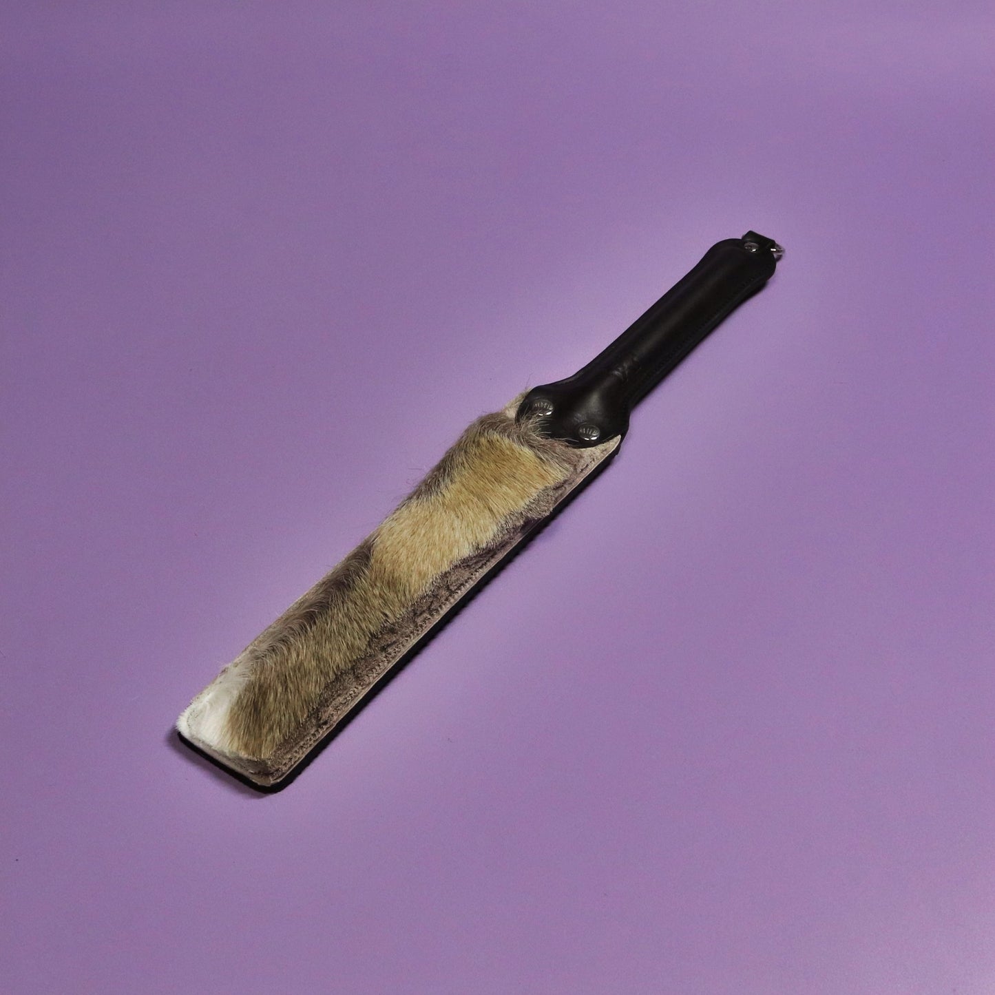 Punishment Paddle - Black Dimpled Rubber & Hair on Hide Reindeer