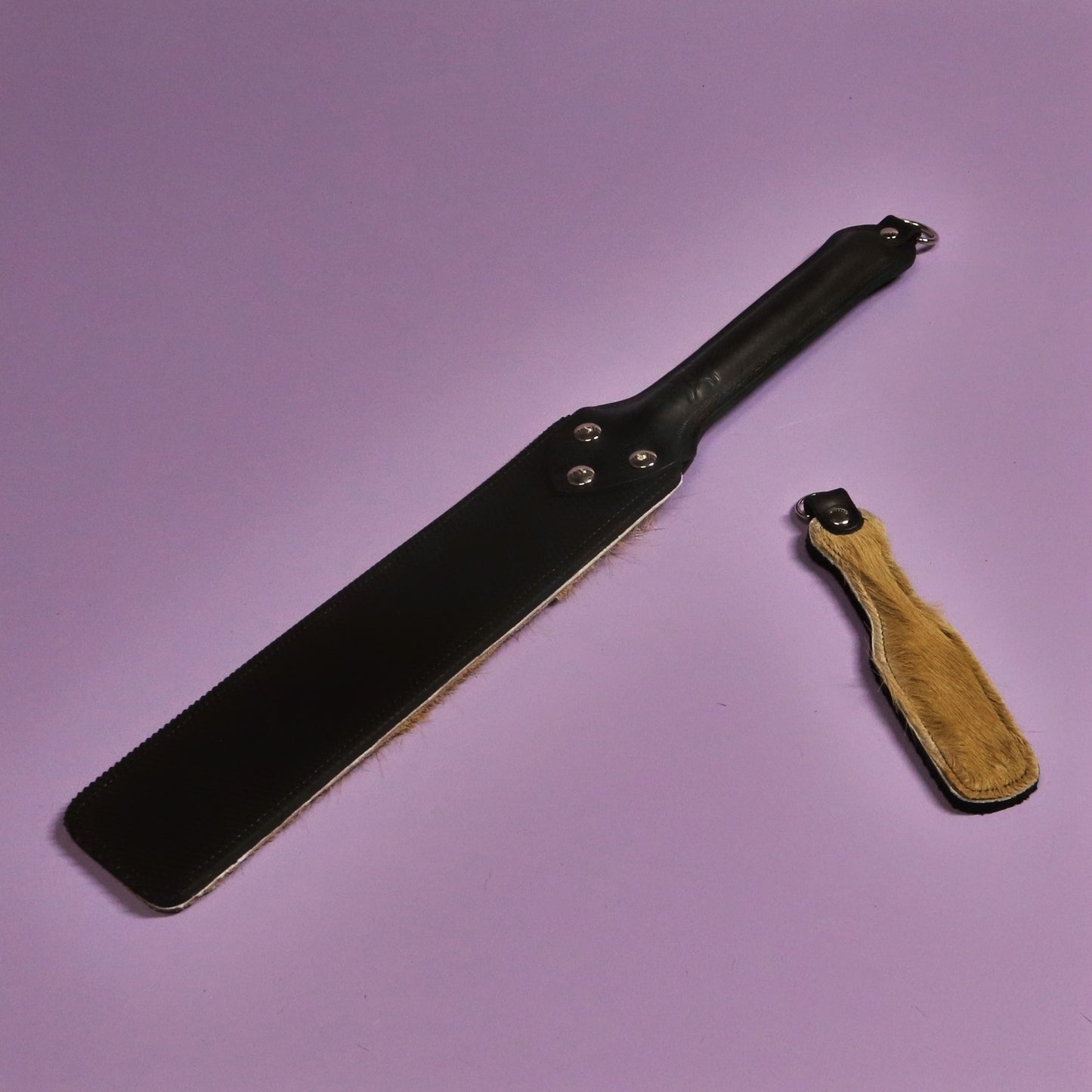 Punishment Paddle - Black Dimpled Rubber & Springbok