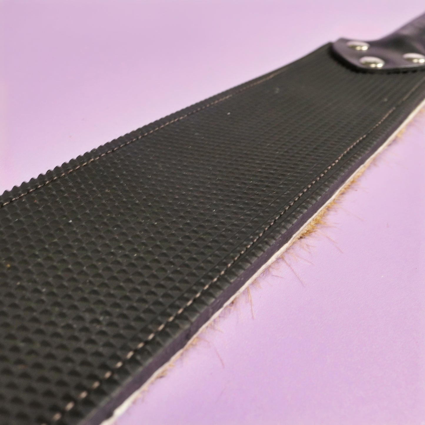 Punishment Paddle - Black Dimpled Rubber & Springbok